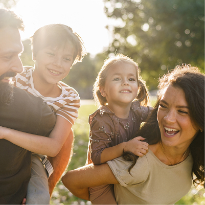 Family Smiling Outdoors